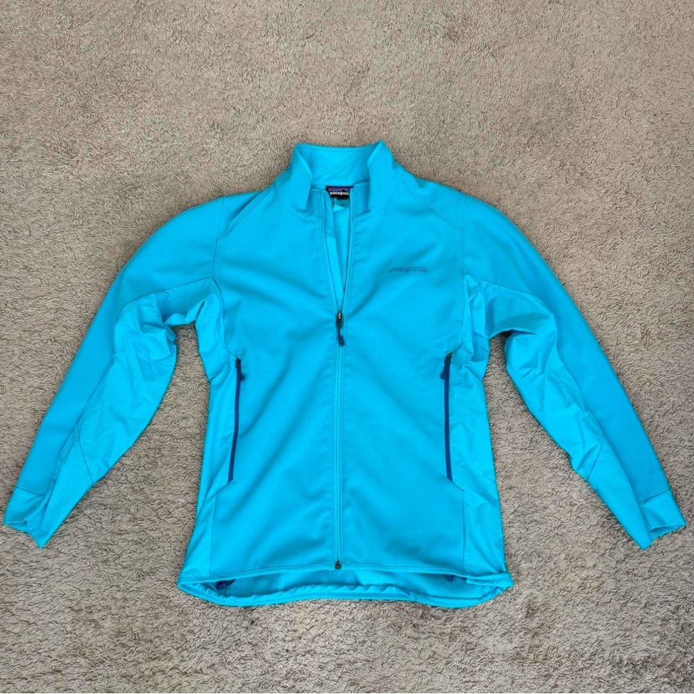 Blue Patagonia lightweight windbreaker jacket (Faults shown)